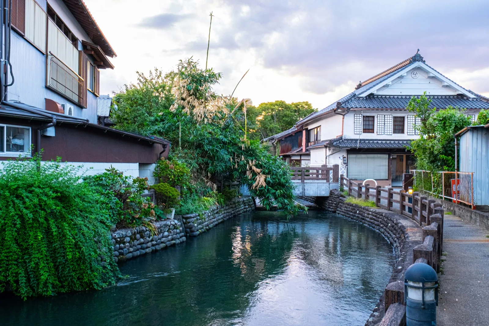 Yatai food stalls by the river at night during a language stay in Fukuoka, Japan