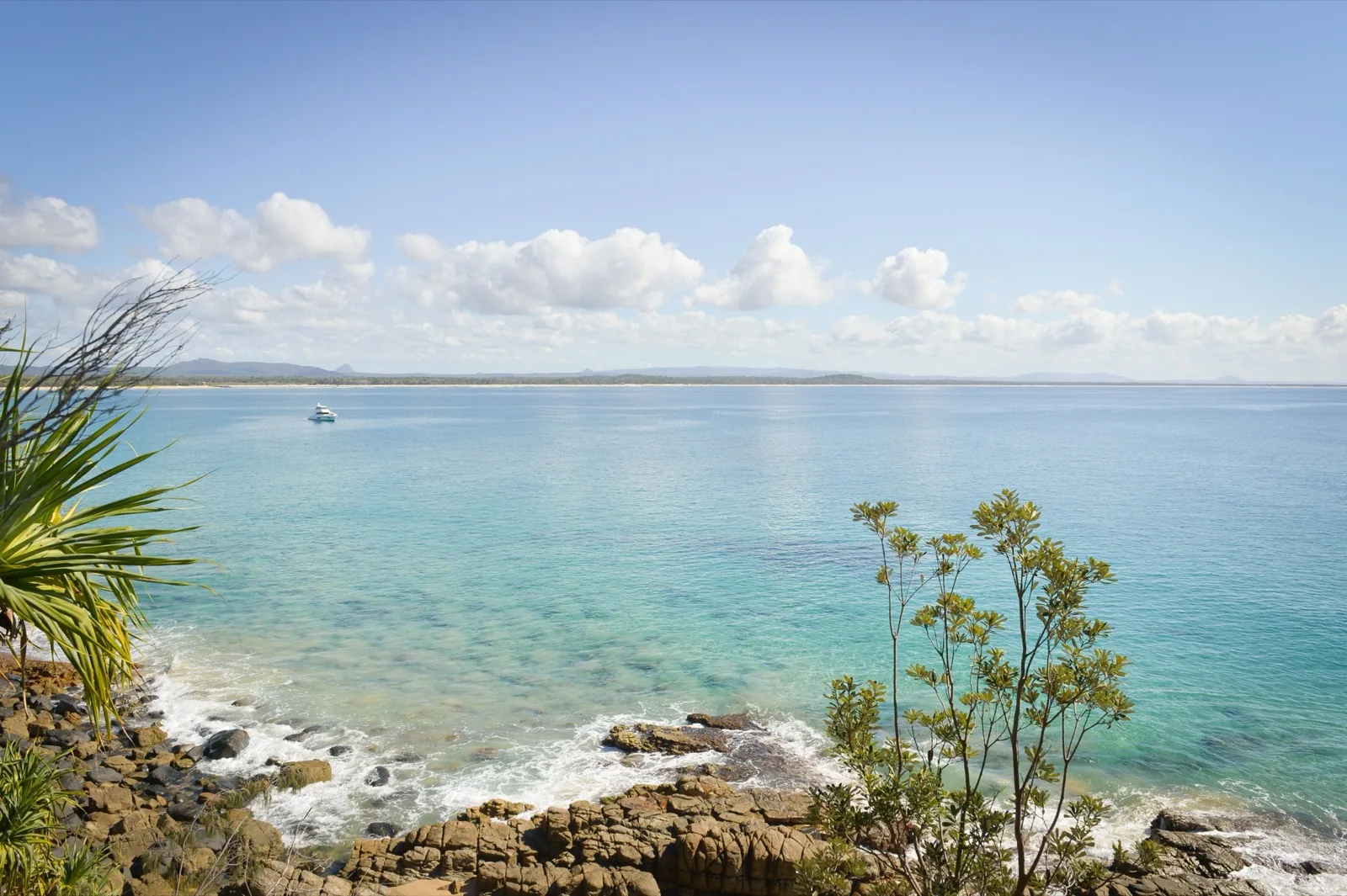 Headland of Noosa National Park above a quiet bay during an English language stay in Noosa
