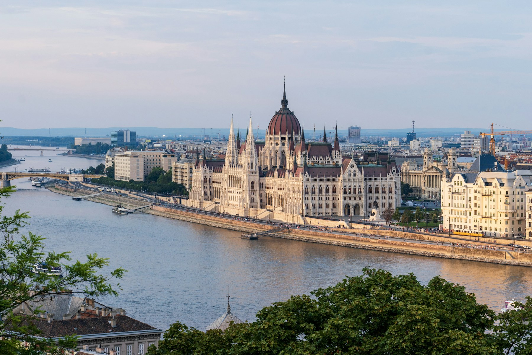Budapest Parliament building reflected in the Danube on a Hungarian cultural school trip